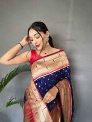 Navy Color Pure Paithani Silk Saree with Rich Woven Pallu, Tassels, and Unique Motif Pattern – Includes Unstitched Blouse Piece.