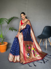 Navy Color Pure Paithani Silk Saree with Rich Woven Pallu, Tassels, and Unique Motif Pattern – Includes Unstitched Blouse Piece.