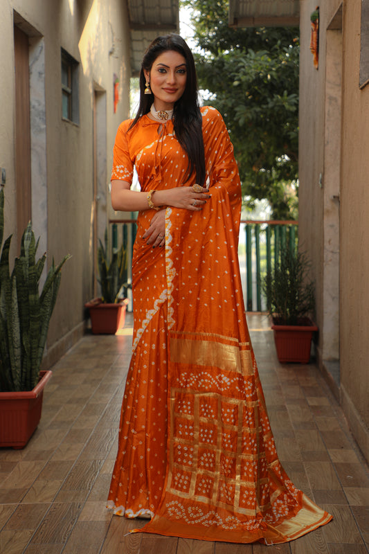 Exquisite Orange Bandhej Silk Saree with Checks Pattern Pallu – Luxurious Handmade Design and Matching Bandhej Blouse.