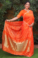 Premium Orange Pure Bandhej Silk Saree with Lagdi Patta Zari Weaving & Rich Pallu | Includes Bandhej Design Blouse.