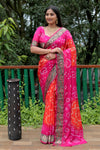 Luxurious Pink Dual Colour Bandhej Silk Saree with Zari Weaving and Broad Border – Soft, Lightweight, and Stylish.