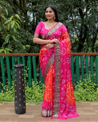 Luxurious Pink Dual Colour Bandhej Silk Saree with Zari Weaving and Broad Border – Soft, Lightweight, and Stylish.