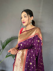 Purple Color Pure Paithani Silk Saree with Rich Woven Pallu, Tassels, and Unique Motif Pattern – Includes Unstitched Blouse Piece.