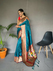 Rama Color Pure Paithani Silk Saree with Rich Woven Pallu, Tassels, and Unique Motif Pattern – Includes Unstitched Blouse Piece.