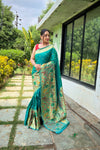 Rama Color Pure Paithani Silk Saree with Traditional Paithani Border and Unique Motif Patterns - Contrast Richly Woven Pallu and Meenakari Motif Blouse.