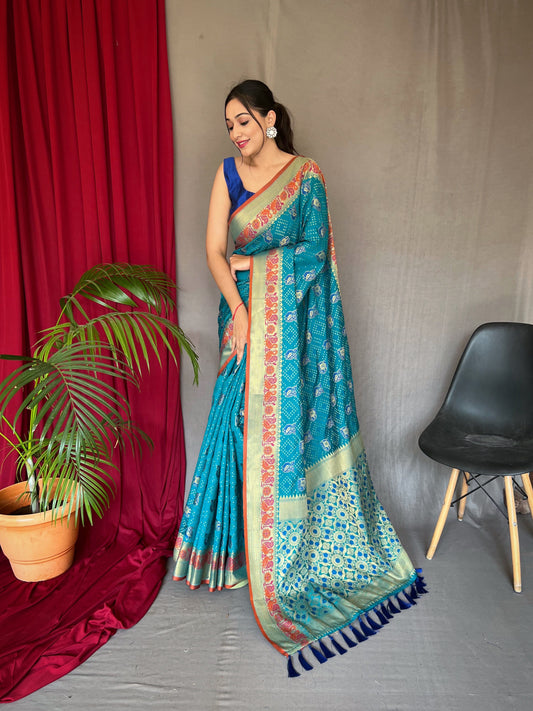 Pure Rama Sky Color Kachii Patola Silk Saree with All-Over Patola Weaving, Meenakari Border, Rich Pallu & Tassels with Unstitched Blouse Piece.