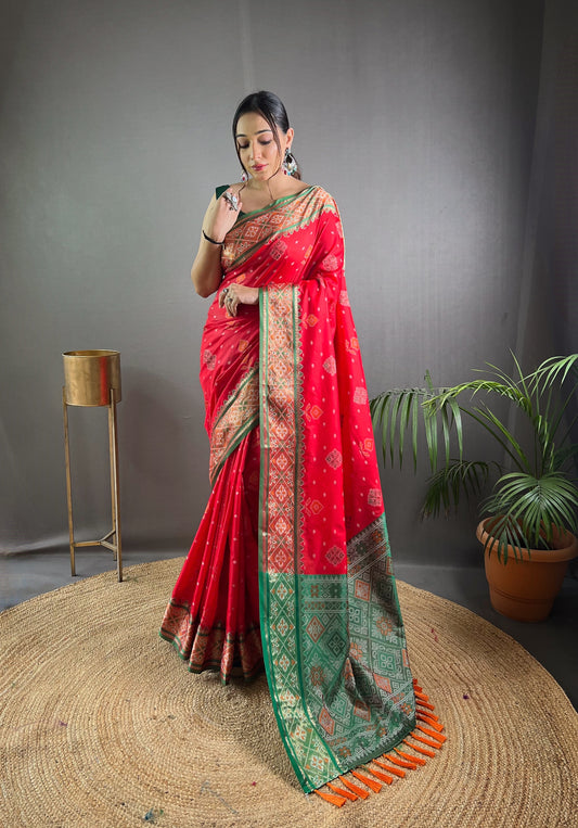 Red Color Soft Rangeen Patola Silk Saree with All-Over Meenakari Weaving | Rich Pallu with Tassels | Unstitched Blouse Piece Included.