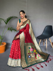 Red Color  Pure Paithani Silk Saree with Rich Woven Pallu, Tassels, and Unique Motif Pattern – Includes Unstitched Blouse Piece.