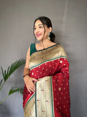 Red Color  Pure Paithani Silk Saree with Rich Woven Pallu, Tassels, and Unique Motif Pattern – Includes Unstitched Blouse Piece.