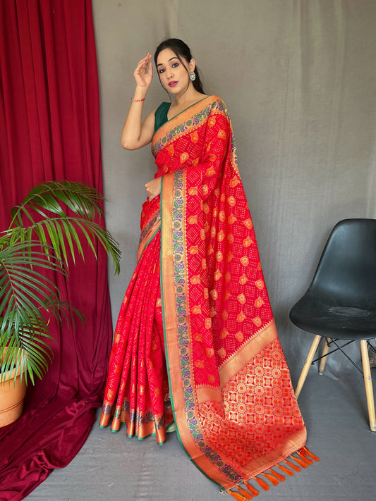 Pure Red Kachii Patola Silk Saree with All-Over Patola Weaving, Meenakari Border, Rich Pallu & Tassels with Unstitched Blouse Piece.