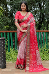 Luxurious Red Dual Colour Bandhej Silk Saree with Zari Weaving and Broad Border – Soft, Lightweight, and Stylish.