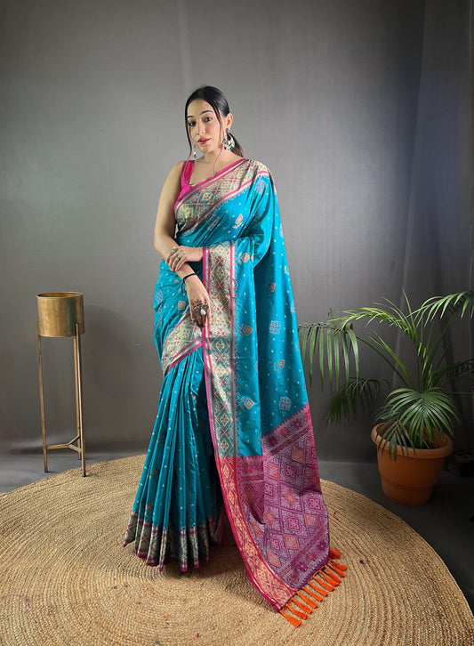 Sky Color Soft Rangeen Patola Silk Saree with All-Over Meenakari Weaving | Rich Pallu with Tassels | Unstitched Blouse Piece Included.