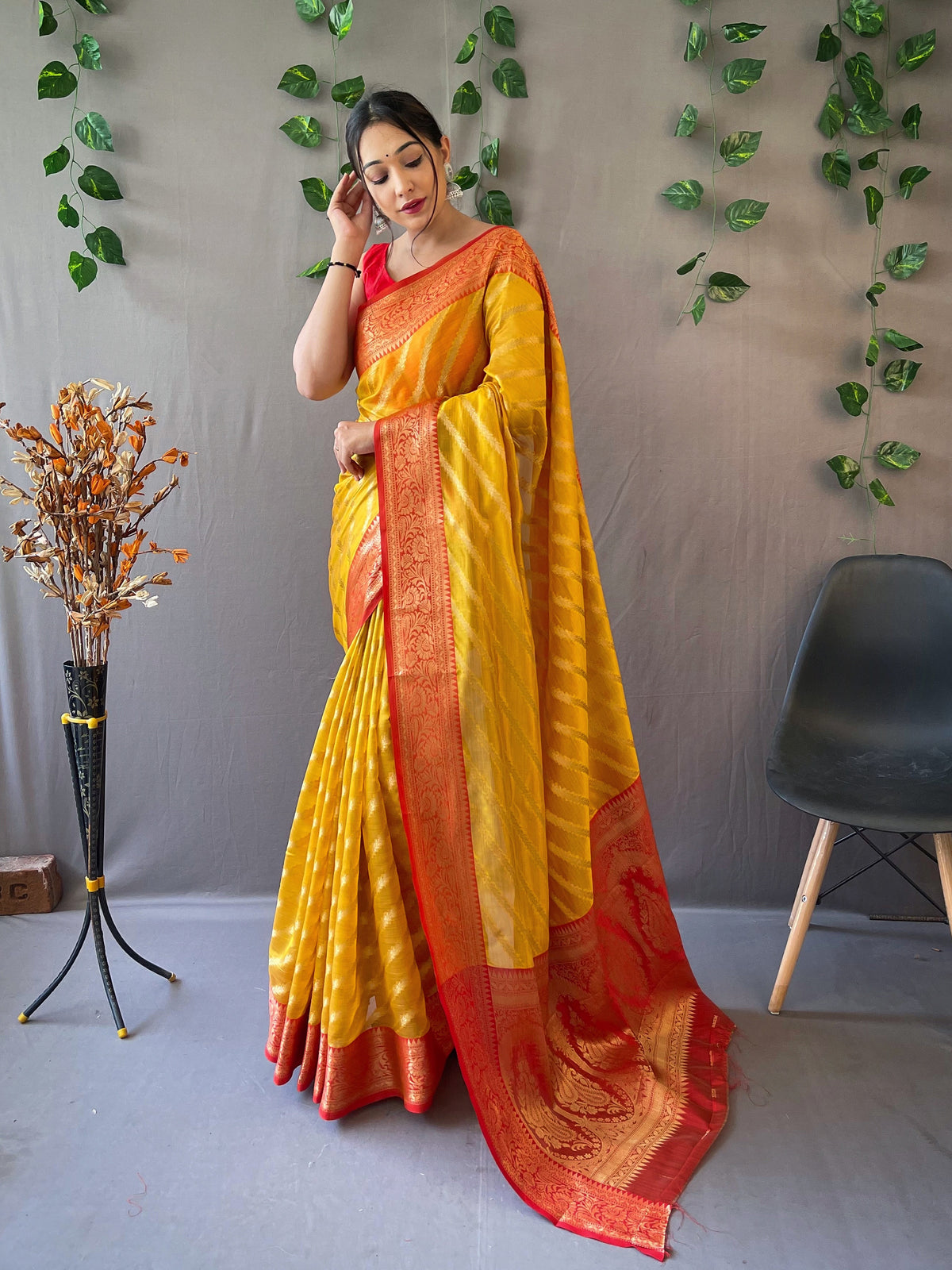 Yellow Pure Organza Saree with Jacquard Border and Rich Pallu Featuring Luxurious Tassels.