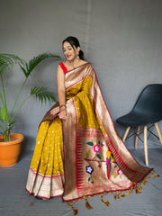 Yellow Color Pure Paithani Silk Saree with Rich Woven Pallu, Tassels, and Unique Motif Pattern – Includes Unstitched Blouse Piece.