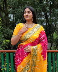 Luxurious Yellow Dual Colour Bandhej Silk Saree with Zari Weaving and Broad Border – Soft, Lightweight, and Stylish.