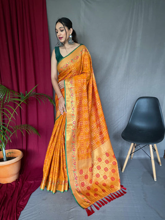 Luxurious Yellow Patola Silk Saree with Paithani Fusion – All-Over Contrast Patola Weave with Meenakari Detailing and Rich Pallu with Tassels.