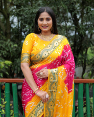 Luxurious Yellow Dual Colour Bandhej Silk Saree with Zari Weaving and Broad Border – Soft, Lightweight, and Stylish.